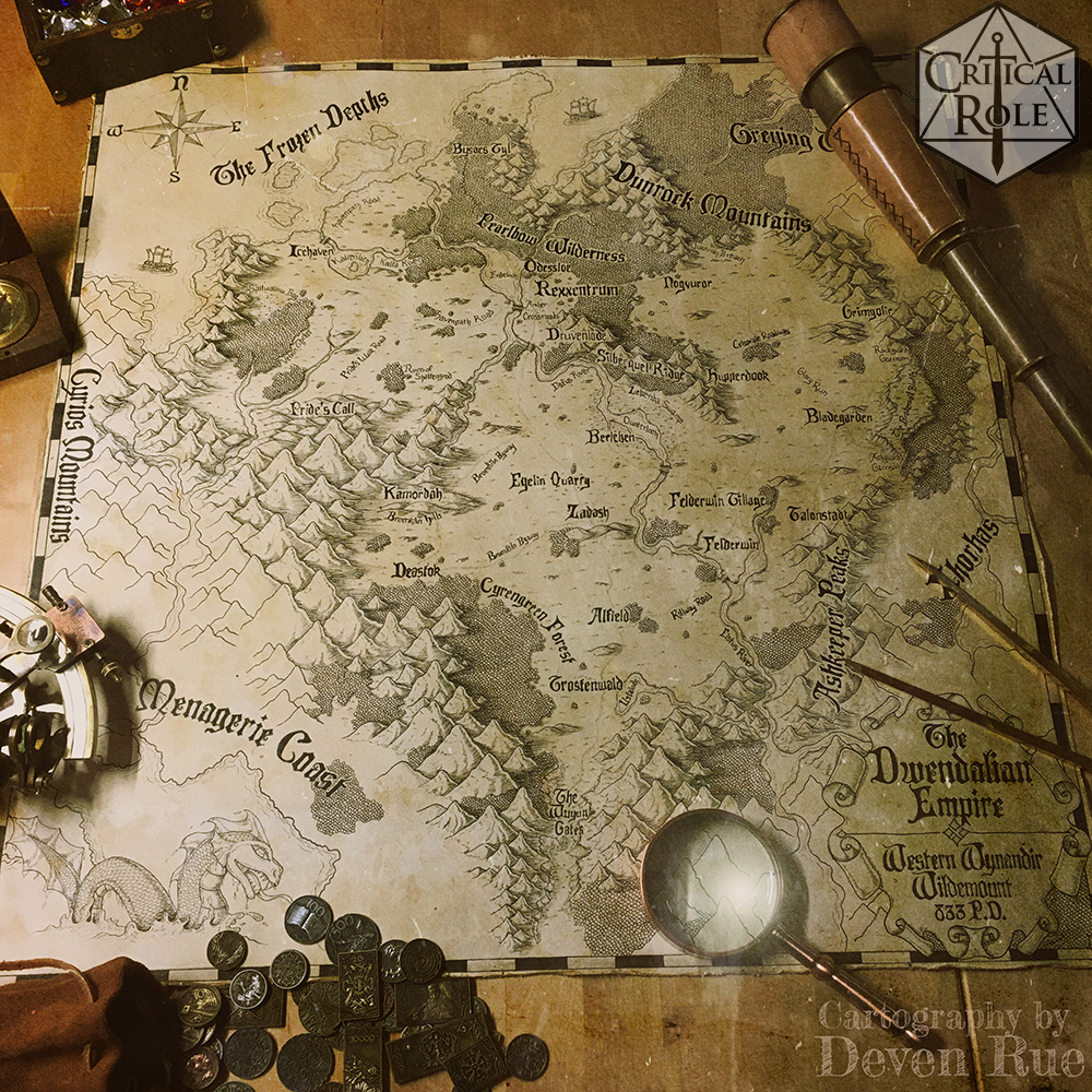 A shot of a map from Critical Role's second season done by Deven Rue. It's done in a pen and ink style and set on what looks like a wooden table with some props around it.